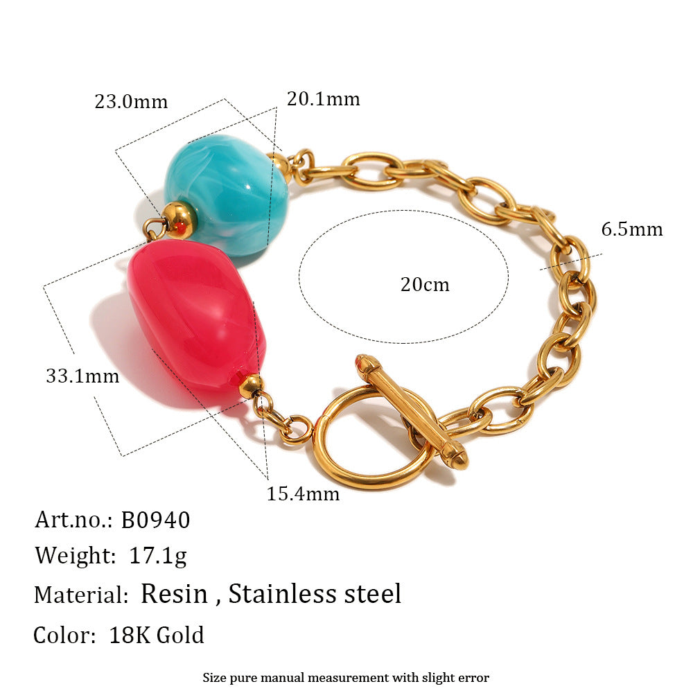Turquoise and bright pink resin bead bracelet with toggle
