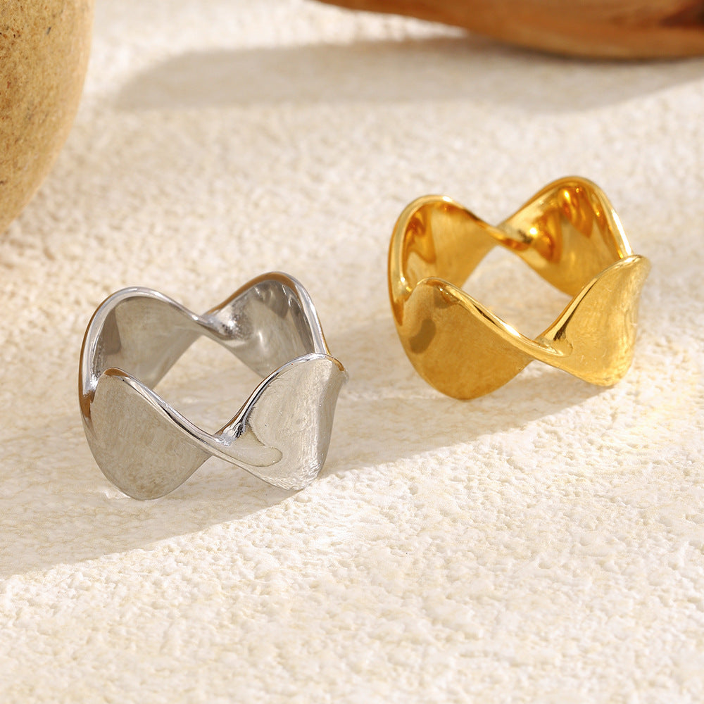 front angle of gold plated and silver stainless steel wave rings
