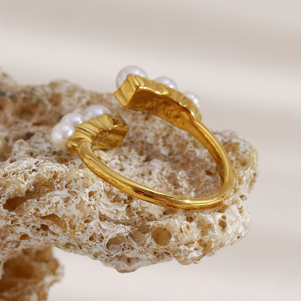 underside view of gold plated imitation pearl open ring