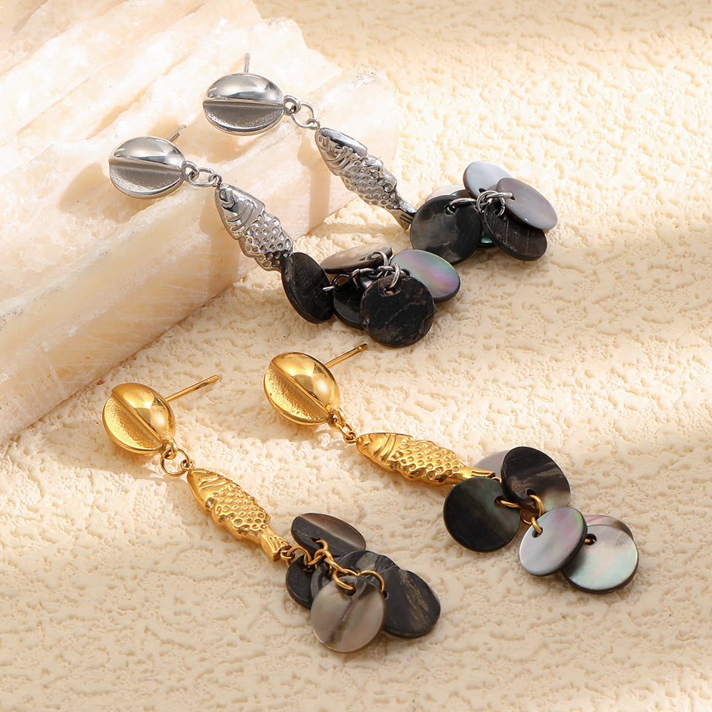 Gold and steel color fish earrings with dark shell discs
