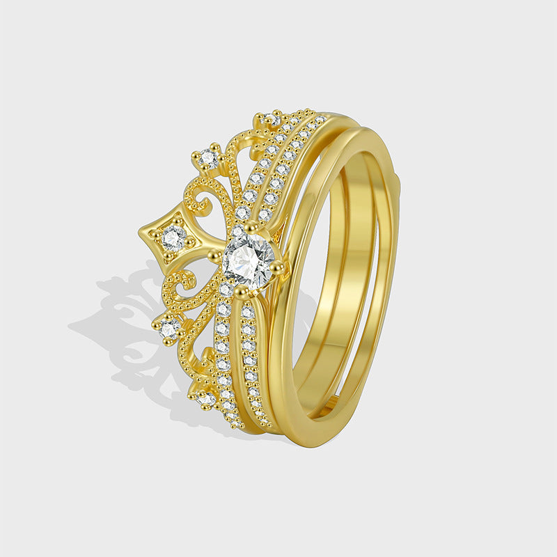 gold plated brass crown ring with round clear center stone