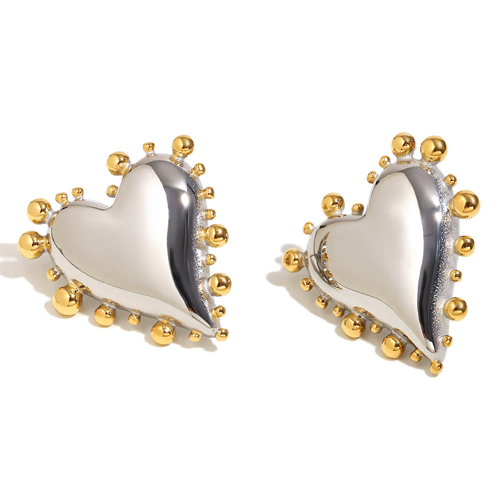 silver-finish heart earrings with irregular gold plated bead borders