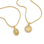Two medallion necklace designs on white background