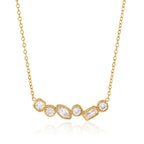 Round marquise and rectangular clear stone arrangement