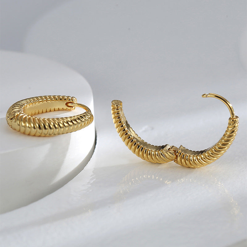 gold plated rope-textured huggie hoops shown open and closed