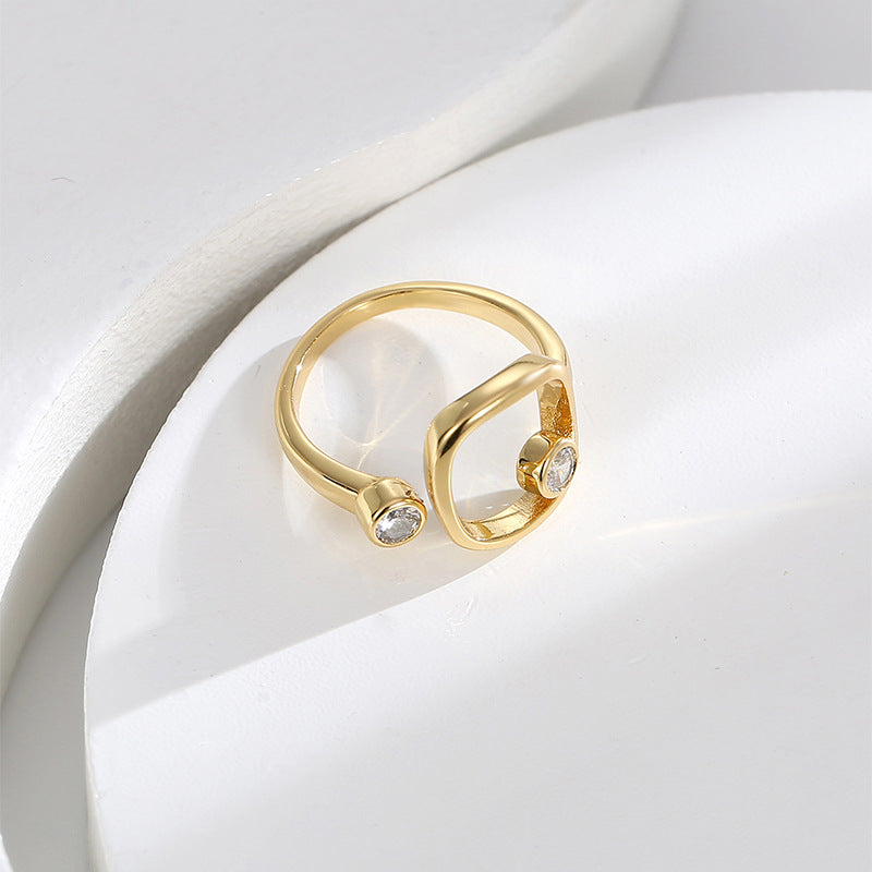 angled view of the rounded-square frame and twin stone settings