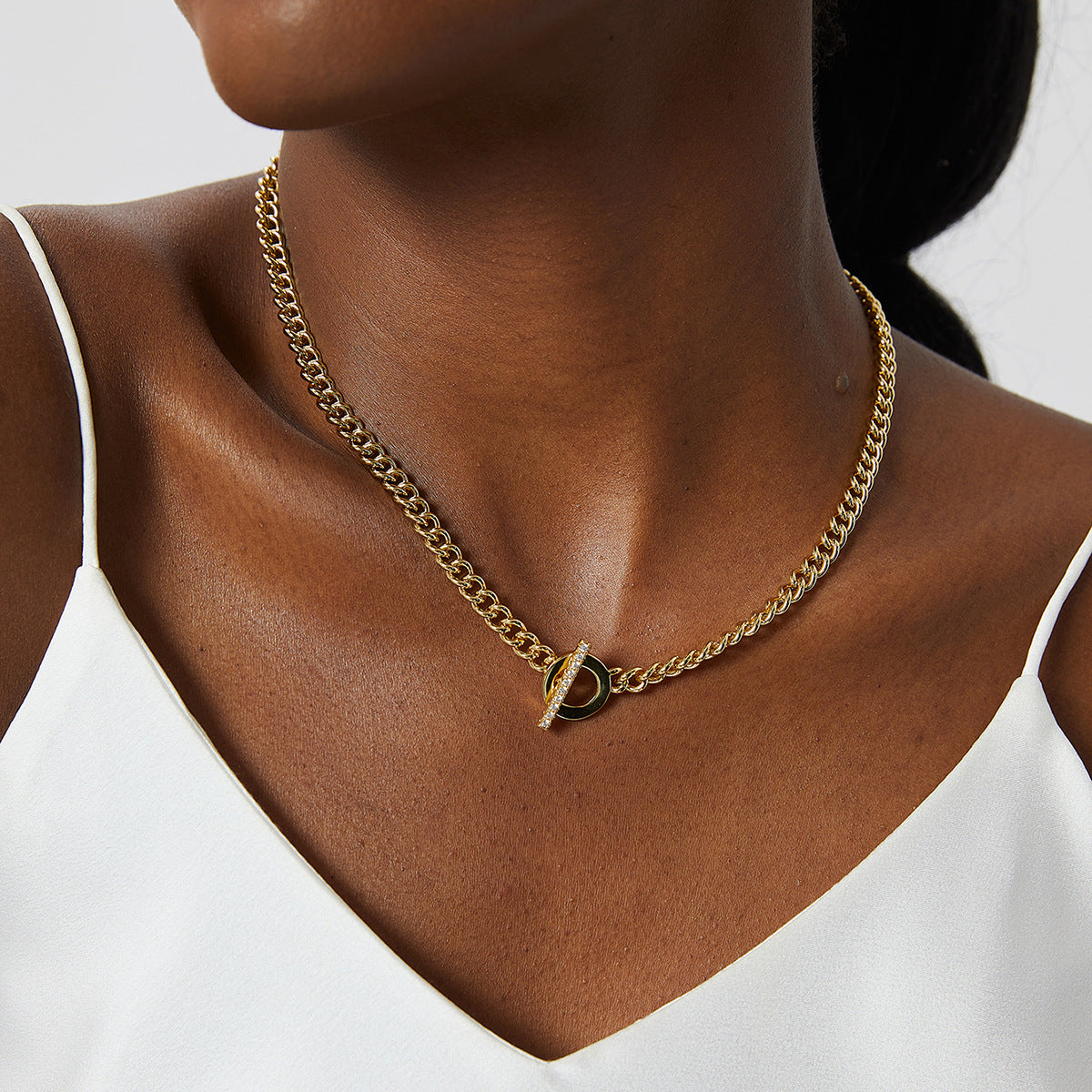 model wearing the gold plated Cuban chain toggle necklace