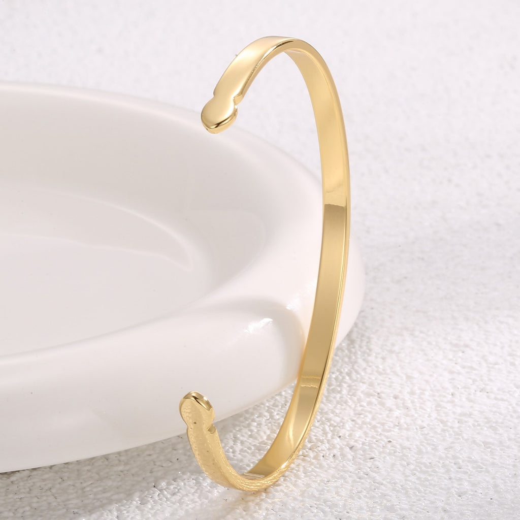 angled view of the polished asymmetric cuff bracelet