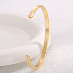 angled view of the polished asymmetric cuff bracelet