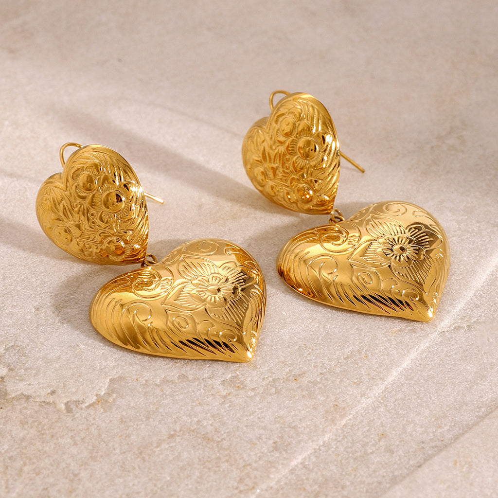 Gold-Tone Embossed Double Heart Stainless Steel Drop Earrings on-model view