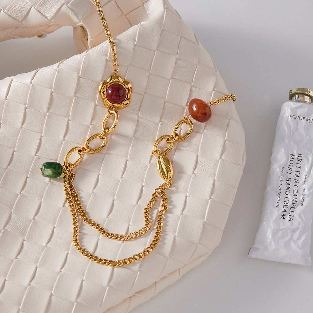 Gold-Tone Resin Bead Stainless Steel Necklace Collection close-up product view