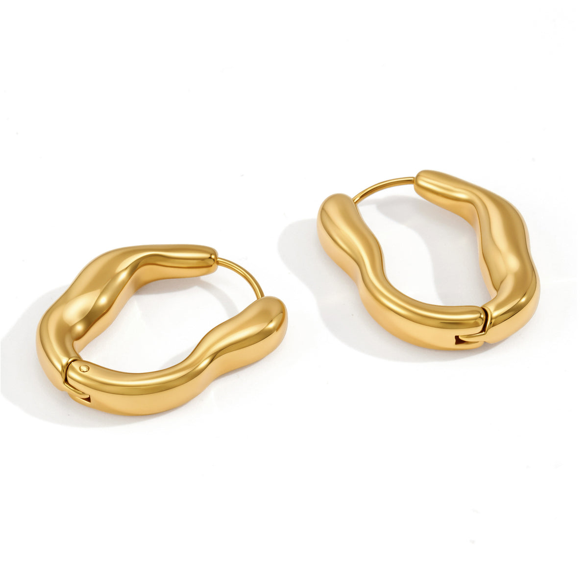 Front and angled views of wavy oval hoops