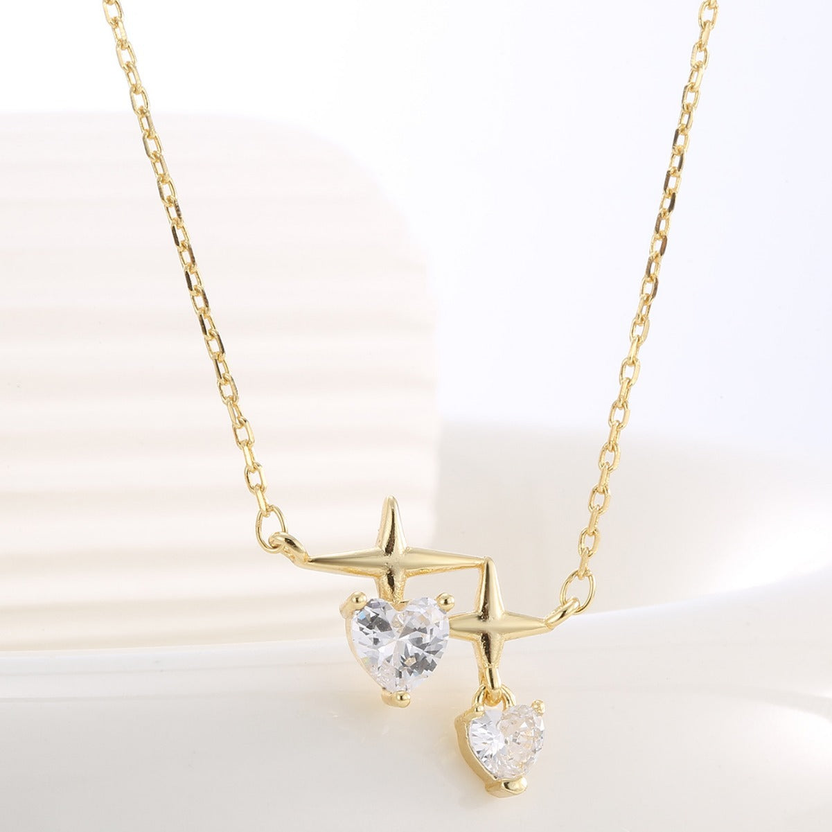close view of polished star motifs and heart-shaped clear stones