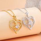 gold and silver double heart pendant necklaces displayed side by side