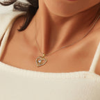 model wearing the gold plated heart halo pendant necklace