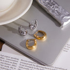 Both zirconia accent hoop finishes on a table