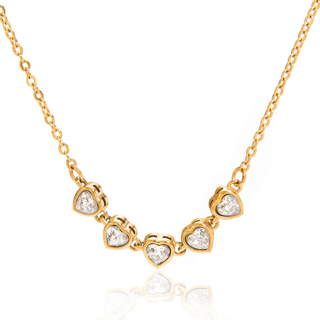 Front view of five graduated clear stone necklace settings