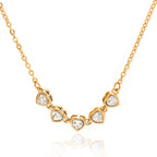 Front view of five graduated clear stone necklace settings