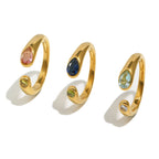 front view of three gold plated two-stone snake ring options