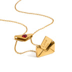 isolated stainless steel love letter envelope pendant and chain