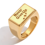 cutout of engraved Never Give Up stainless steel signet ring