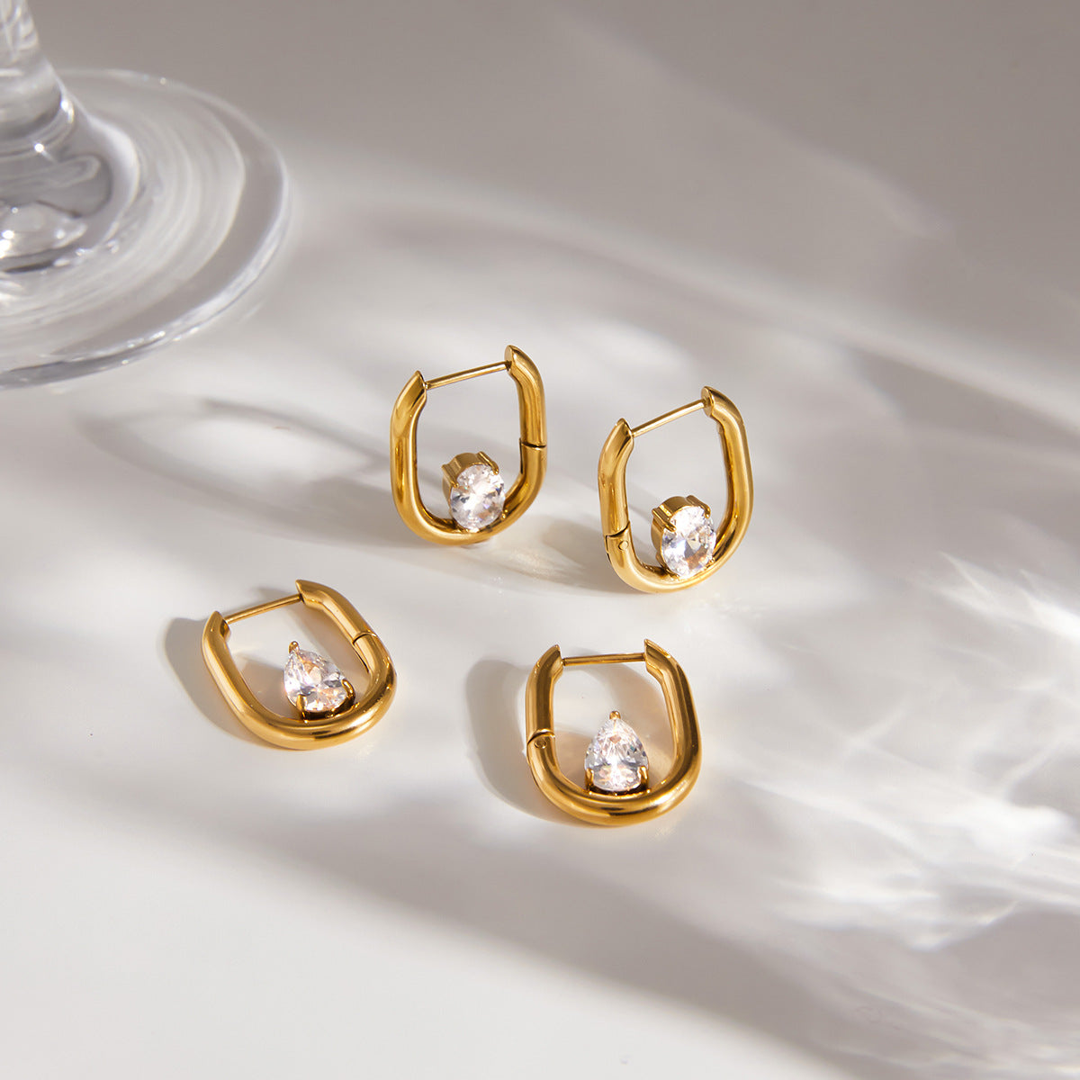 Round and pear stone U-hoops arranged together