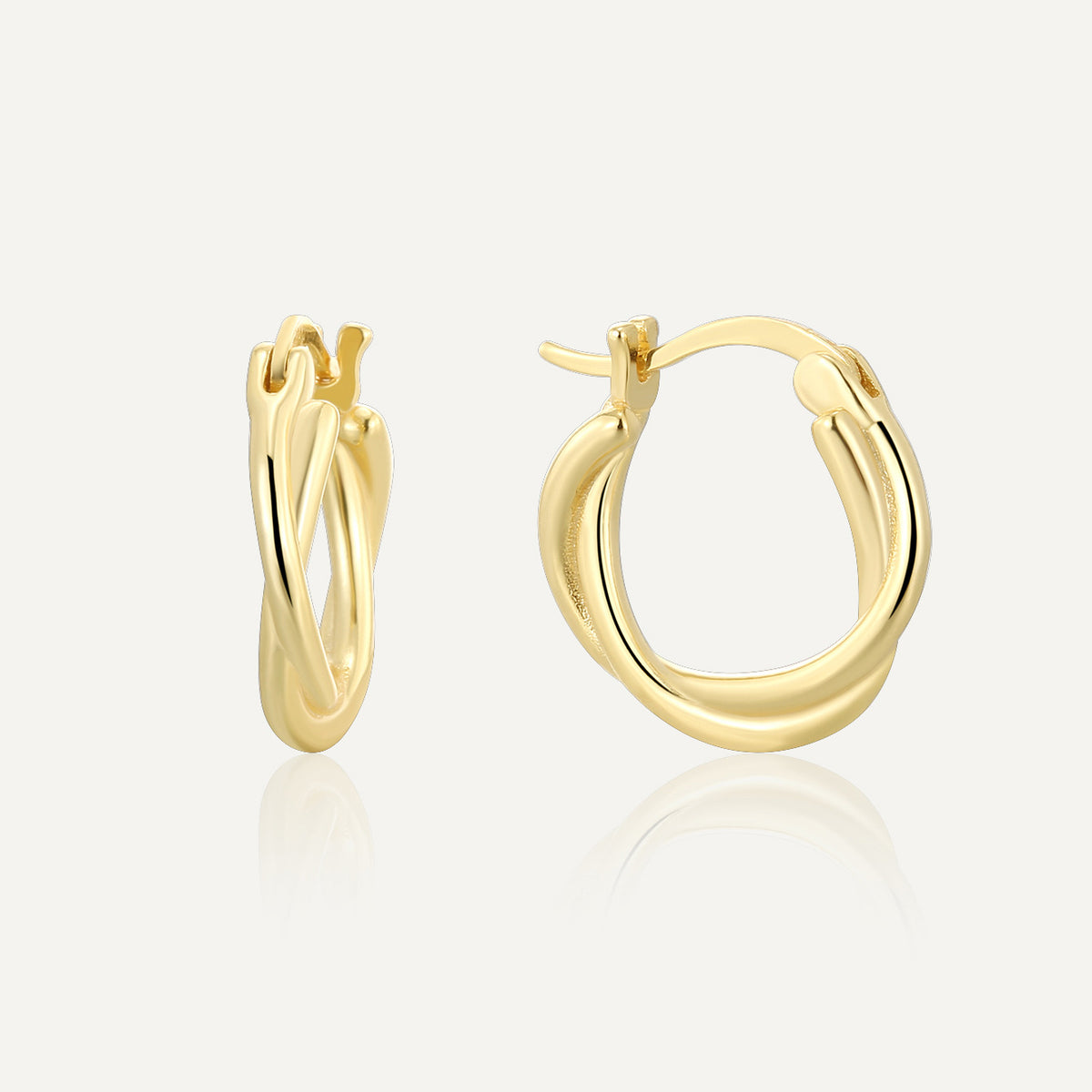 front and side cutout of gold plated offset double-line huggies