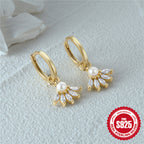 gold plated pearl and marquise clear-stone drop hoop earrings on white