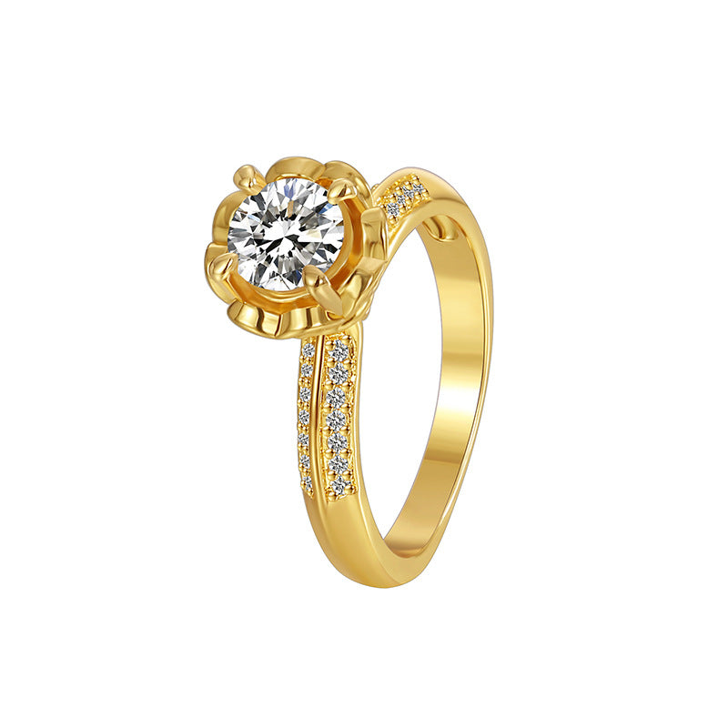 white-background view of clear stone brass solitaire ring