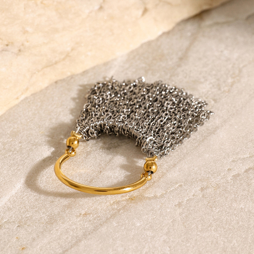 Silver-tone chain curtain with gold-tone attachment details