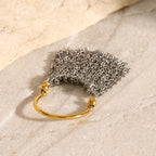 Silver-tone chain curtain with gold-tone attachment details