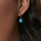 blue cushion cabochon hook earring worn on the ear