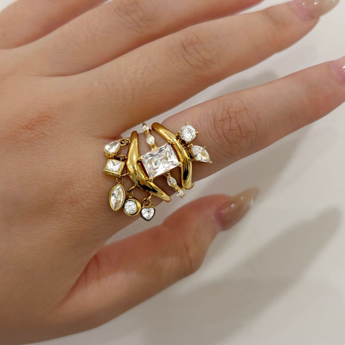 Clear accent rings styled together on a finger