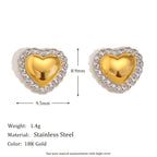 Small gold tone heart studs with textured silver tone border