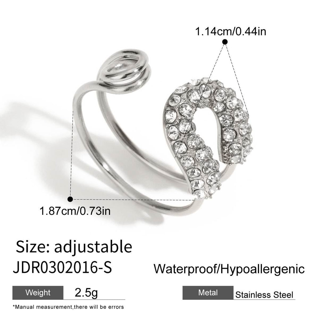 Open ring with decorated loop and polished spiral ends