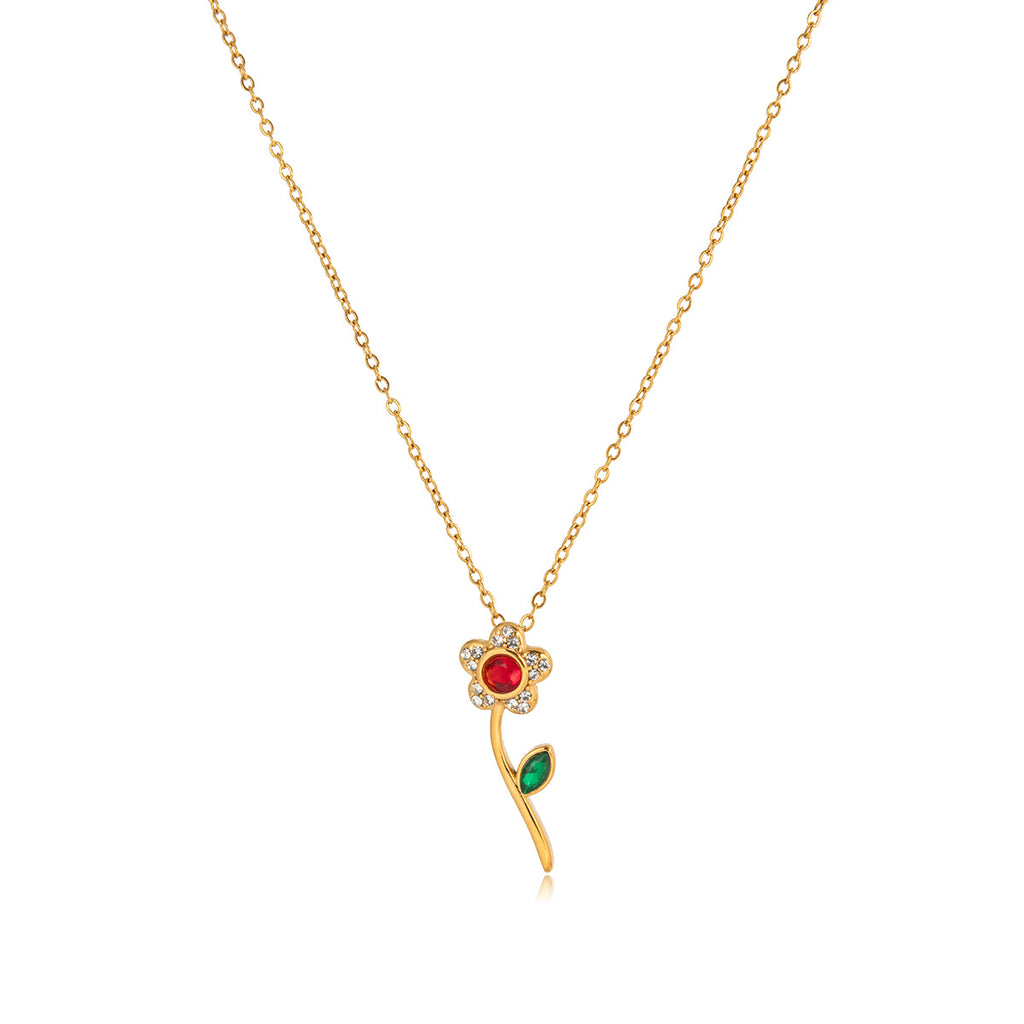 isolated red and green rhinestone rose pendant necklace
