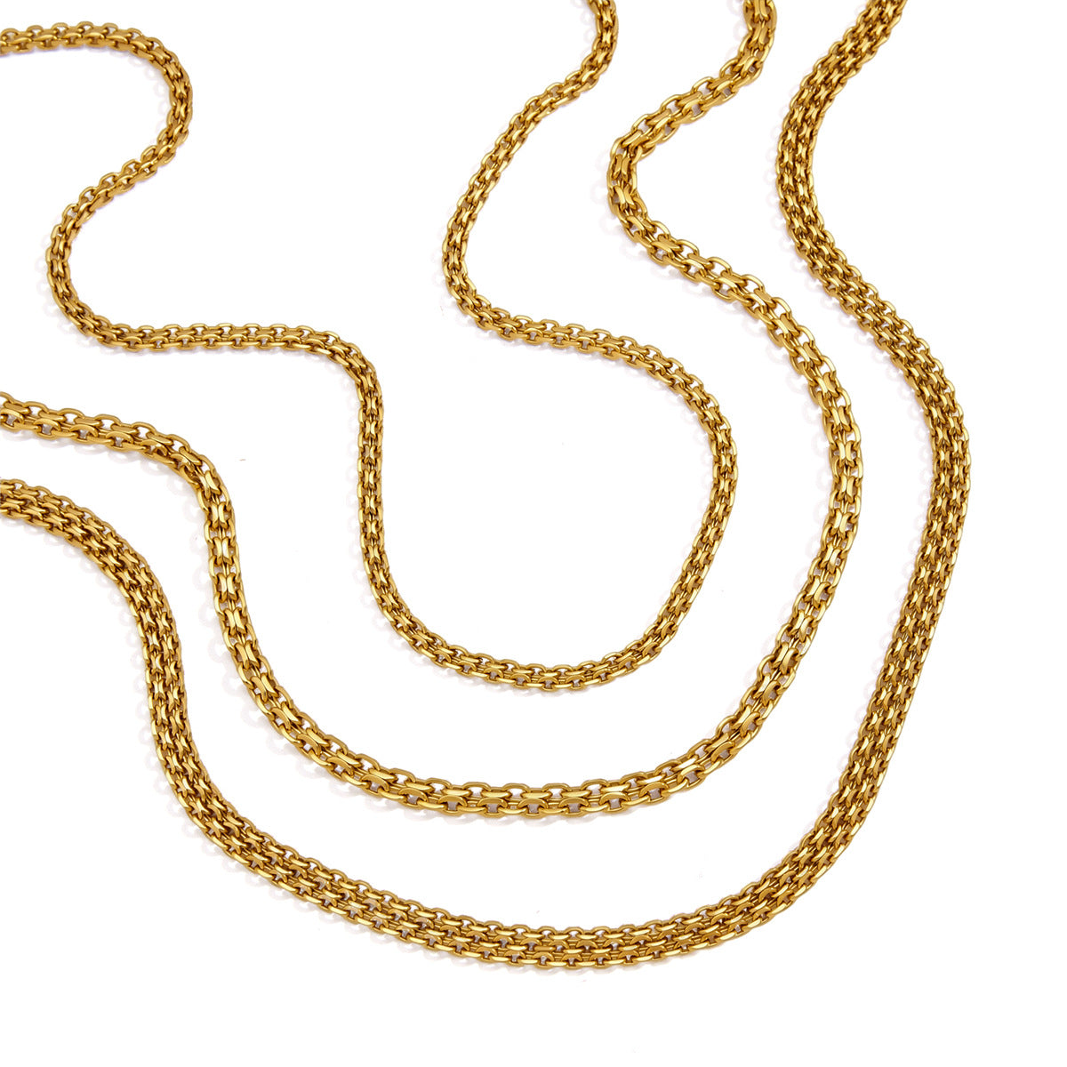 Gold tone stainless steel chains laid in curved lines