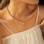 Gold Plated Stainless Steel Textured Medallion Necklace — styled view