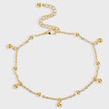 gold plated anklet with spaced polished bead drops