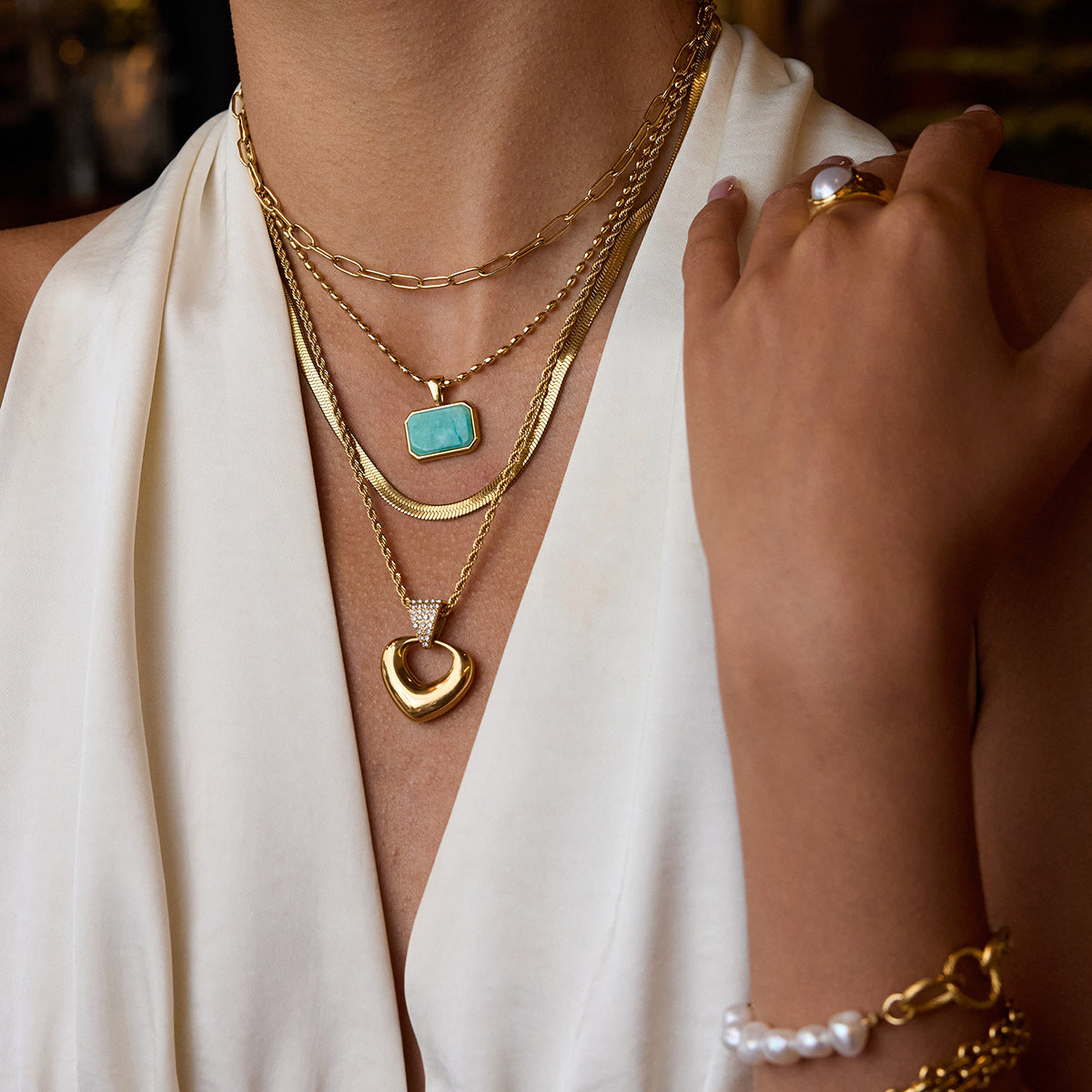 Gold-Tone Stainless Steel Heart Necklace Collection — styled view