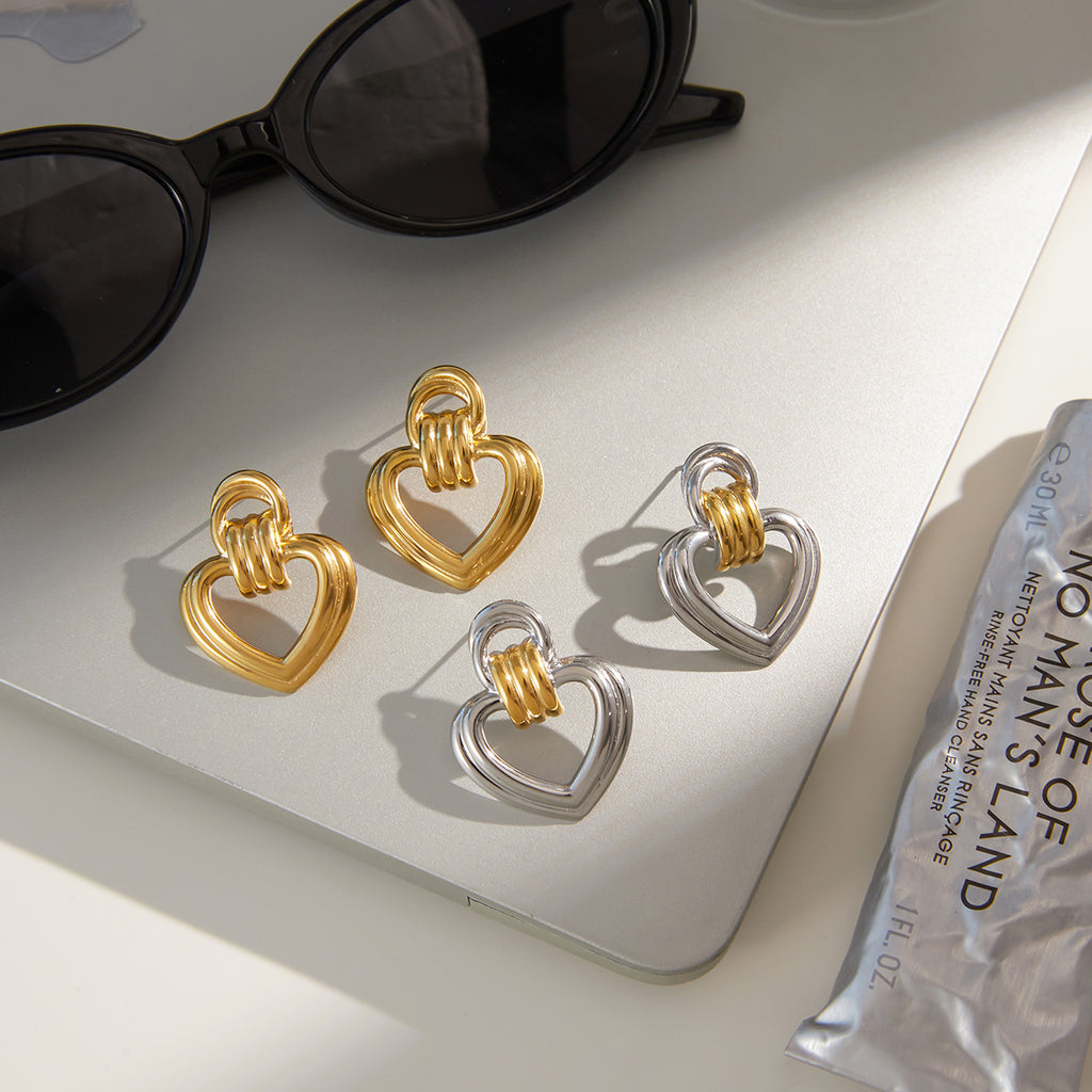 Two-Tone Open Heart Stainless Steel Drop Earrings — front view of the gold outer-heart option