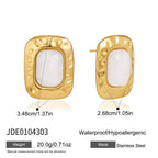 White resin stainless steel earrings with size and weight reference