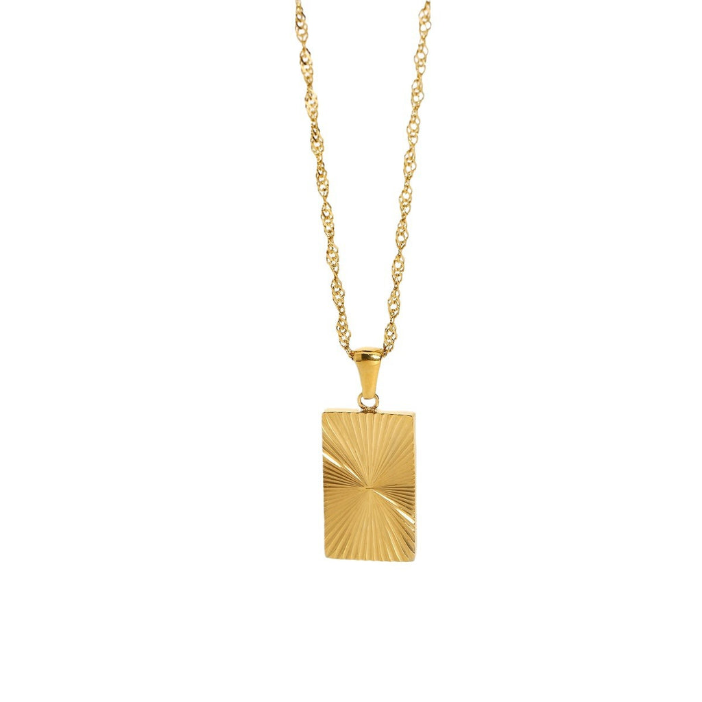 isolated gold plated rectangular sunburst pendant and textured chain