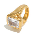 isolated gold plated rectangular clear-stone signet ring