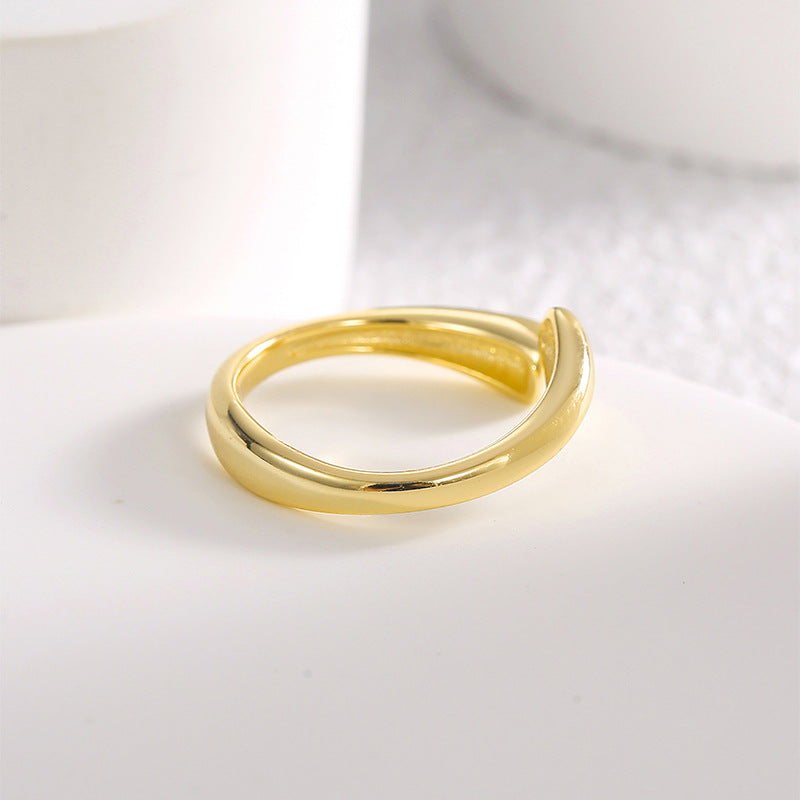 profile view of the polished adjustable gold plated open ring