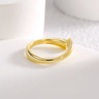 profile view of the polished adjustable gold plated open ring