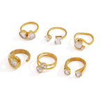 Six gold tone statement ring options front view