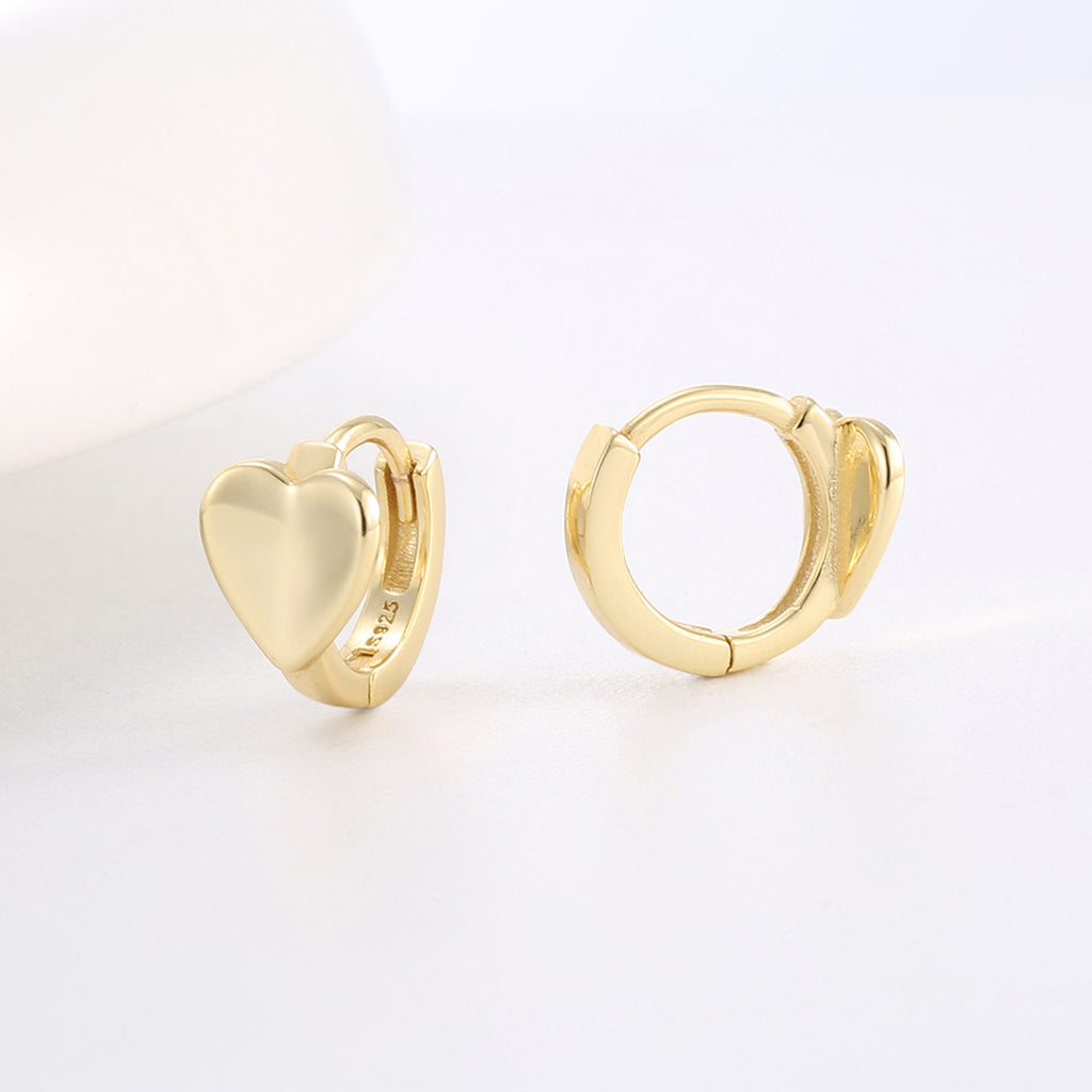 open and closed side views of polished heart huggie hoops