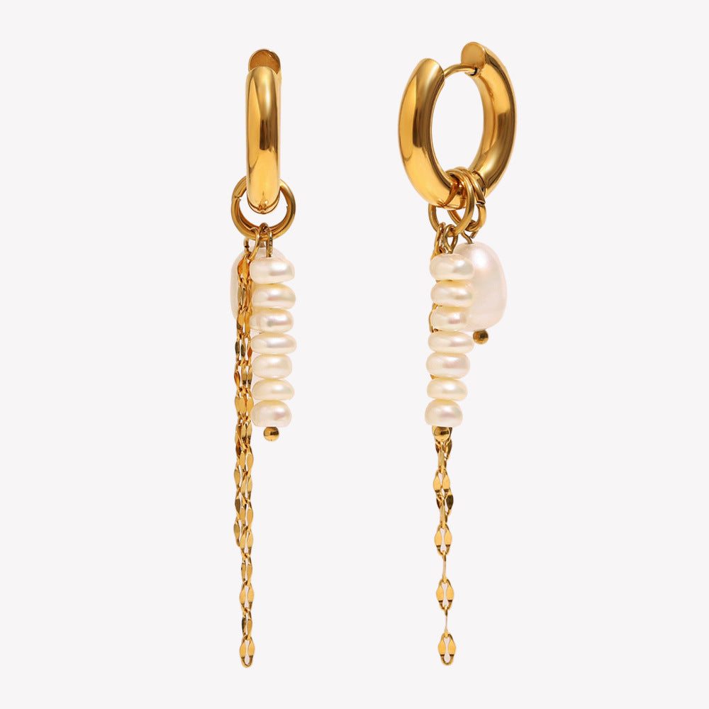isolated front and side view of asymmetric pearl tassel huggie earrings