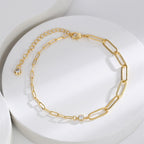 clear stone paperclip chain anklet arranged on white